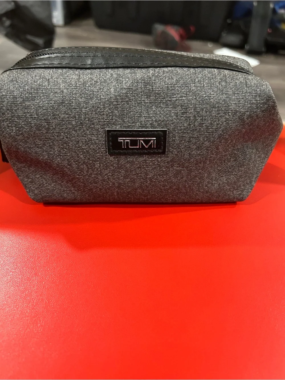 Tumi Gray Textured travel Toiletry Dopp Kit contents sealed